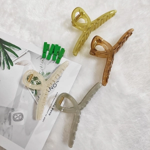 Set of four jelly-colored large ribbon hair claws in translucent resin for thick hair