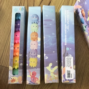 Macro shot of colorful octopus toy sets in sea-themed packaging with TWH06 model details