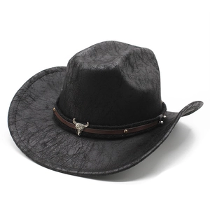 Vintage western cowboy hat in black distressed leather with bull head ornament