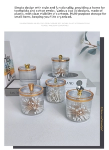 Macro shot of luxury ribbed cotton swab jar with golden rim and elegant crown lid handle