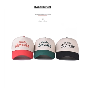 Detailed embroidery of Diet Coke letters on three contrast baseball caps in cotton