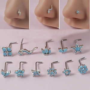 Set of 12 turquoise gemstone nose studs in silver metal with diverse shapes like snakes and flowers