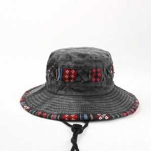 Close-up of black washed cotton bucket hat with ethnic embroidery and adjustable wind rope