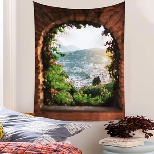 Detail of Mediterranean landscape wall tapestry showing coastal town view and stone archway