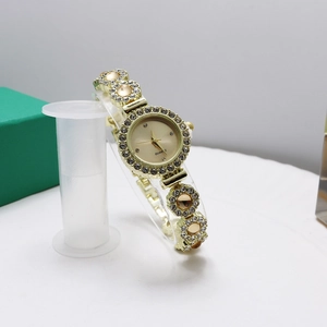 Elegant gold quartz watch for women with flower links and beige chalcedony stones