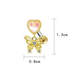 Close-up of golden butterfly and pink heart piercing jewelry showing 1.3cm x 0.8cm size