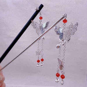Elegant silver butterfly tassel earrings with red beads and bells in retro style