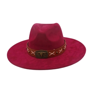 Detailed view of burgundy felt cowboy hat with bull skull metal buckle and studded band