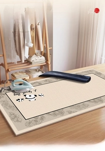 Detail of crystal velvet heat resistant mat with panda pattern and great day slogan