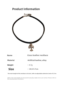 Detail of black faux leather choker with silver cross pendant and adjustable buckle link
