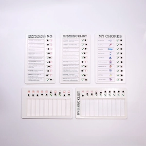Detail view of five white ABS memo boards with sliding checklist buttons for RV and chores