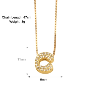 Macro shot of gold-plated letter C pendant with zircon stones and 47cm chain specifications