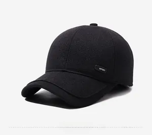 Detail view of the black wool texture and SPORT label on a thermal ear protection cap
