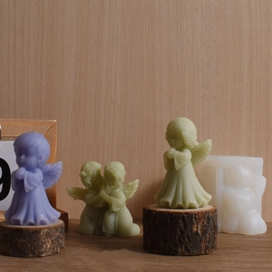 Detailed silicone mold for DIY kissing angel candles and decorative plaster ornaments