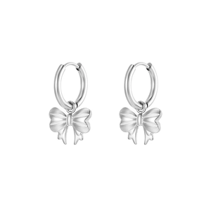Silver titanium steel hoop earrings with textured bow pendant on a clean white background