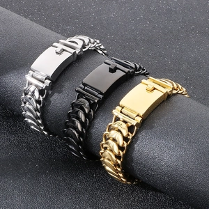 Mens woven steel bracelets in silver, black, and gold colors on cylindrical stand