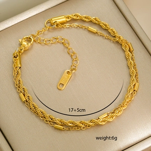 Detail of double-layer gold stainless steel chain showing lobster clasp and 17+5cm length
