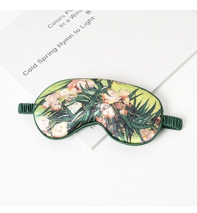 Detail showing Van Gogh oil painting style floral print on silk sleeping eye mask