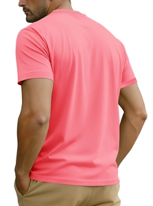 Back view of a man wearing a bright pink cotton t-shirt with detailed muscle lines