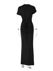 Detail view of black slim-fit maxi dress featuring elegant cross lace-up back design