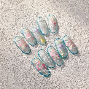 Close-up of Chinese dragon nail stickers with ice crack texture and blue borders