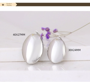 Polished silver stainless steel oval photo locket pendants in 40x27mm and 30x24mm sizes