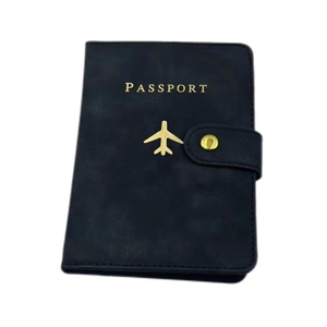 Deep blue PU leather RFID passport holder with gold airplane icon and secure snap closure