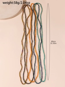 Detailed view of colorful seed bead waist chains with length of 80cm and weight of 58g