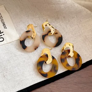 Retro geometric leopard print earrings with gold hammered metal and acetate ring pendants