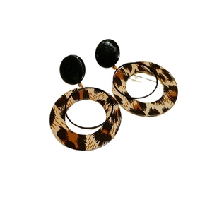 Leopard print star circle earrings with gold plating and black stud in a modern design