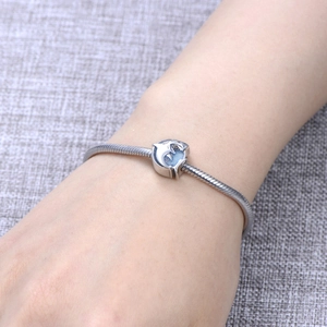 S925 sterling silver shark charm on a snake chain bracelet featuring blue glitter enamel