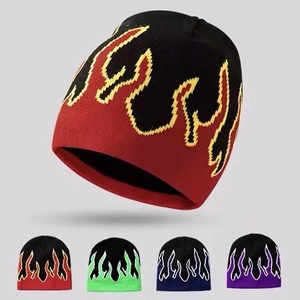 Close-up of flame pattern knit beanies in various color combinations for winter