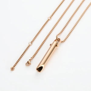 Detail showing rose gold mindful breathing pendant with elegant box chain and lobster clasp