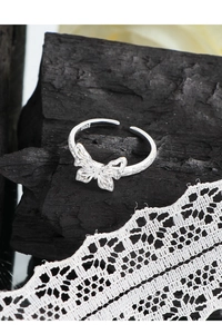 Macro view of S925 sterling silver butterfly ring with hollow texture and S925 stamp