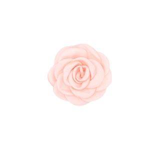 Close-up of pink handmade satin camellia flower showing detailed petal texture