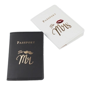 Matching Mr and Mrs PU leather passport covers in black and white with gold lettering