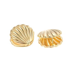 Elegant gold shell-shaped hoop earrings with a metallic luster on a clean white background