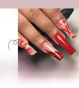 Detail view of Valentine's coffin nails with red hearts and XO patterns #JP2250