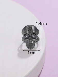 Macro shot of gothic black skull ring showing 1.4cm height and 1cm width dimensions