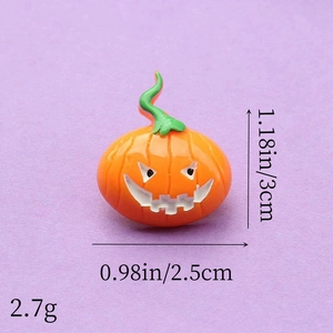 Detail view of resin Halloween pumpkin charm with exact size 3cm by 2.5cm dimensions