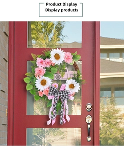 Pink festive wreath with sunflowers, vintage truck decor and a black-white plaid bow