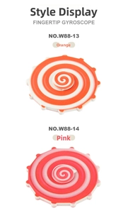 Close-up of pink and orange double-sided rainbow fingertip gyroscopes on white background