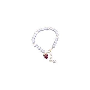 Gold-plated pearl bracelet with purple dragon fruit pendant and adjustable lobster clasp