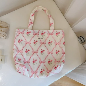 Petit sac en toile à imprimé fleuri avec nœuds roses et étiquette Simple Wish