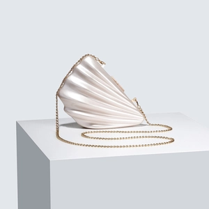 Elegant pearl white shell-shaped acrylic evening clutch bag with gold chain strap