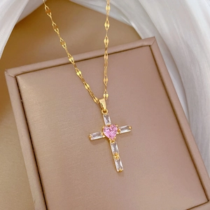 Pink heart crystal and cross pendant necklace on gold chain with cubic zirconia stones