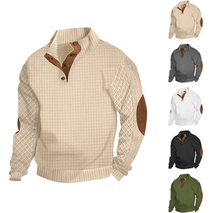 Detail of waffle knit shirt featuring buttoned Henley neck and elbow patches for men