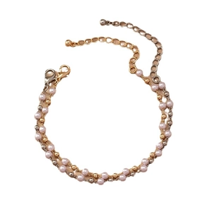 Double-layered bracelet featuring pink faux pearls and metallic gold-silver beads