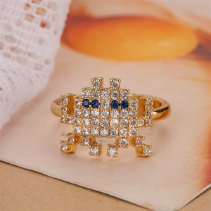 Detail of pixel alien ring with micro-paved blue and white cubic zirconia stones