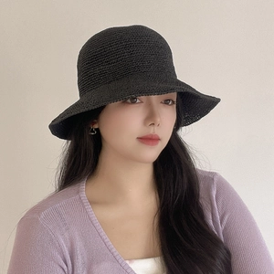 Handmade black crochet straw bucket hat with breathable hollow weave and sun protection